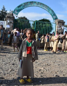 Kiya Mulisa Negera in front of her school, Ethiopia, Africa 2023